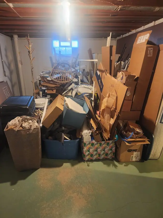 Roll-off dumpster container at job site for 8 Yard Dumpster Rental in Islandia